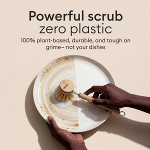 Bamboo Brush Set: brush scrubbing a plate clean, powerful plant-based scrub with zero plastic