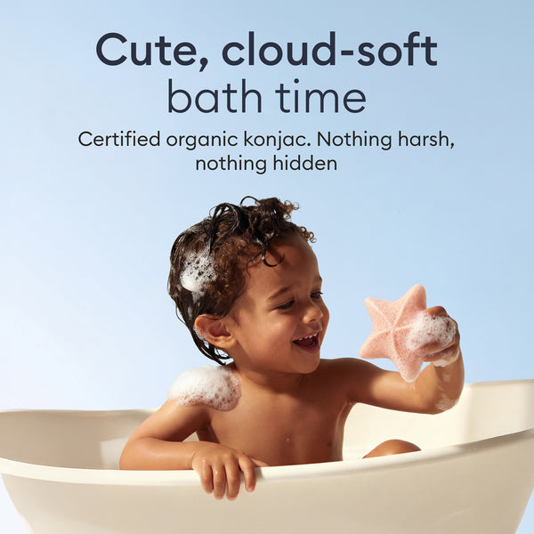 Baby Konjac Sponges: toddler in the bath holding a starfish sponge, certified organic konjac