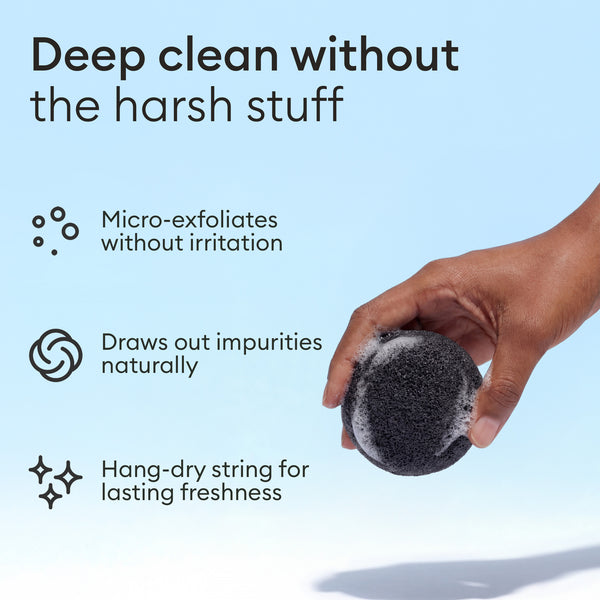 Konjac Face Sponges: hand holding the charcoal sponge, micro-exfoliates and draws out impurities
