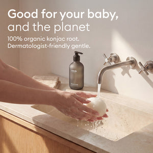 Konjac Body Sponge: hands lathering the sponge at the basin, 100% organic konjac root
