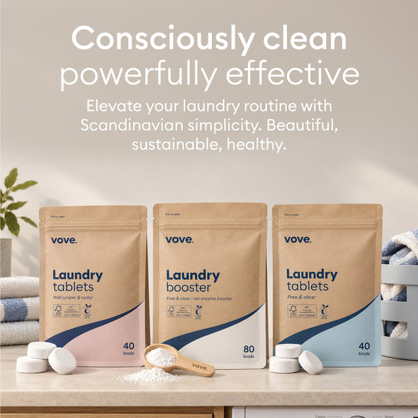 Laundry Detergent Starter Set: laundry tablets and laundry booster pouches on a laundry room counter