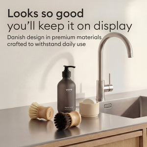 Cleaning Essentials: brush styled on a kitchen counter beside a soap dispenser