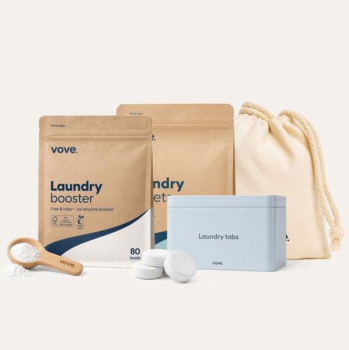 Laundry Essentials: laundry booster pouch with its wooden scoop, laundry tablets pouch, storage tin and dryer balls in their storage bag
